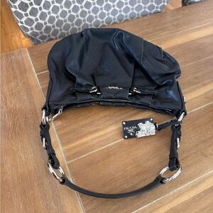 Prada Black Leather Hobo Bag with Silver Accents
